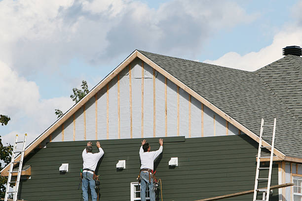 Professional Siding Installation technician working in Paris, IL